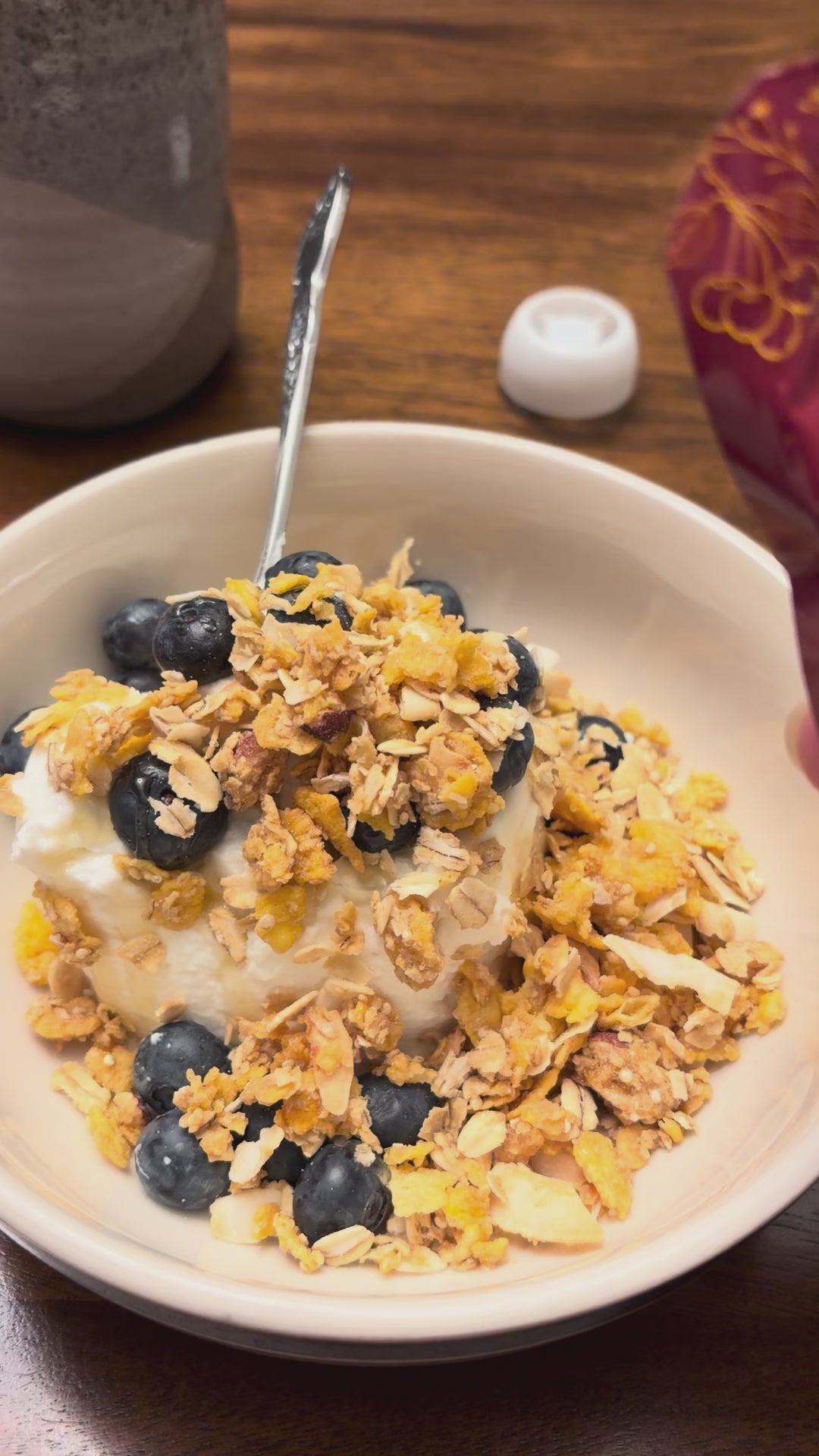 NOORA Calm poured over yogurt with berries and granola